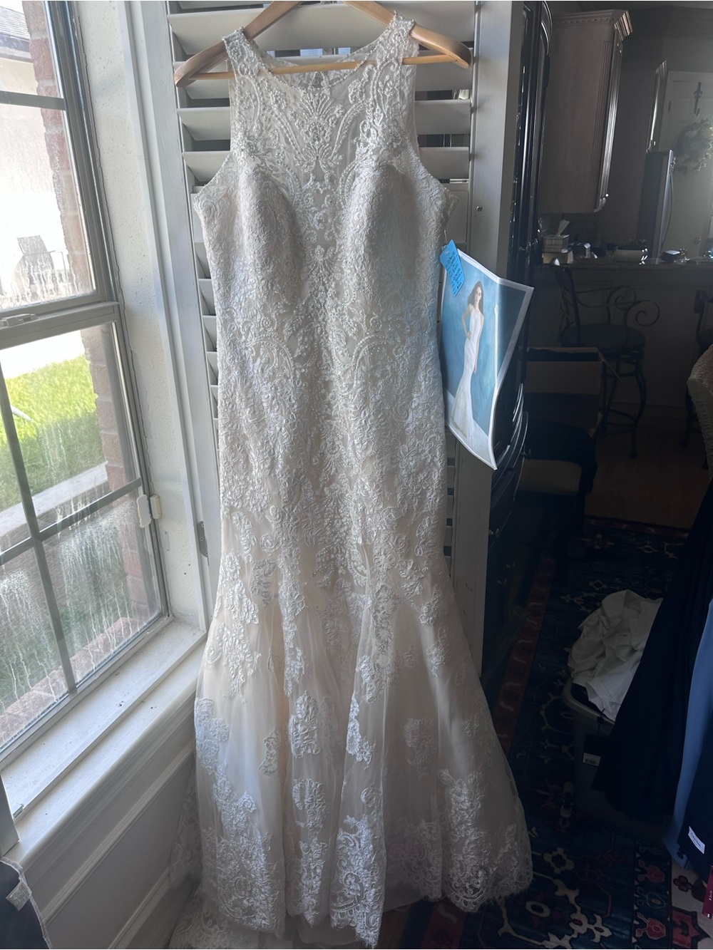 Sleeveless Ivory Lace Fit-and-Flare Wedding Dress